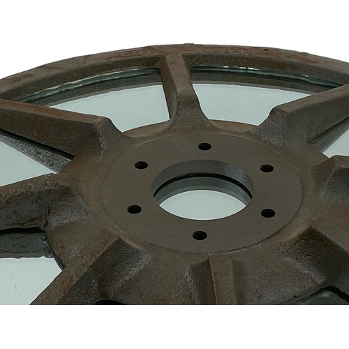 1285 - Lacquered iron tractor wheel mirror, 73cm diameter