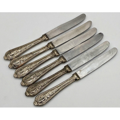 27 - Set of six Continental 800 silver handled serrated dessert knives, 14.5oz gross