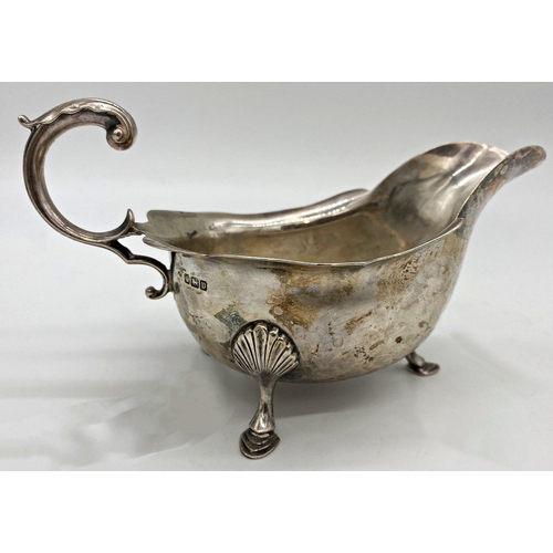 46 - Early 20th century Georgian style sauce boat, C-scroll handle, acanthus hoof feet, maker marks worn,... 