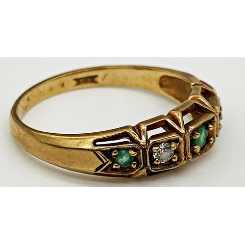 202 - A 9ct gold ring set with White Sapphire and Green Aventurine stones. Size Q 1/2. Weight 2.9 grams ap... 