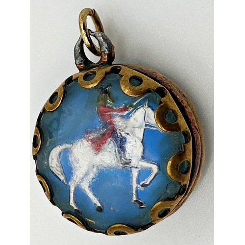 177 - A base metal fob with a painted and intaglio cut glass panel to both sides depicting a soldier with ... 