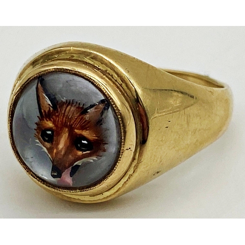 181 - A 9ct gold signet ring set with a painted and intaglio carved Essex crystal depicting a fox's head i... 