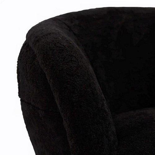 1258 - Cool black sheepskin lounge chair on brass tapered legs