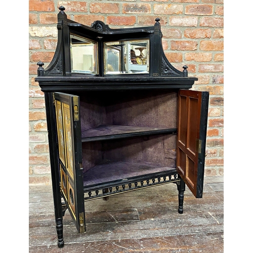 1143 - Aesthetic movement corner cabinet the raised back fitted two bevelled mirror panels, the two cupboar... 
