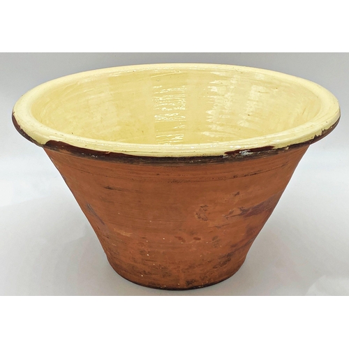 1017 - Good large antique terracotta dairy bowl with yellow glazed interior, 27cm high x 48cm diameter