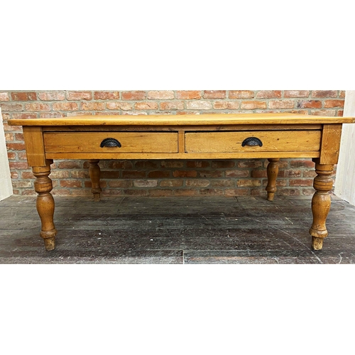 1235 - Victorian pine kitchen table, fitted with two drawers on turned legs 180cm long x 108cm wide