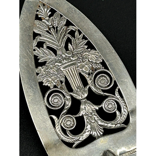 31 - Interesting Continental silver cake slice, with pierced blade and ebony handle, 30cm long