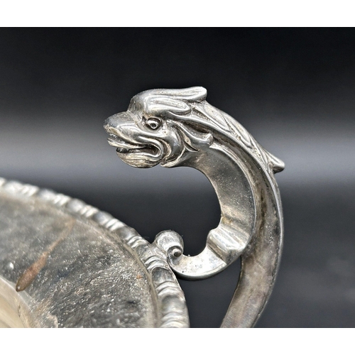 63 - Early 20th century silver twin handed pedestal dish, with mythical beast handles, maker mark worn, C... 