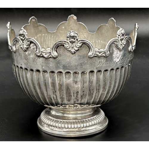 65 - Edwardian silver rose bowl, raised cast cherub head rim and half fluted bowl, inscribed 'Won by Lady... 