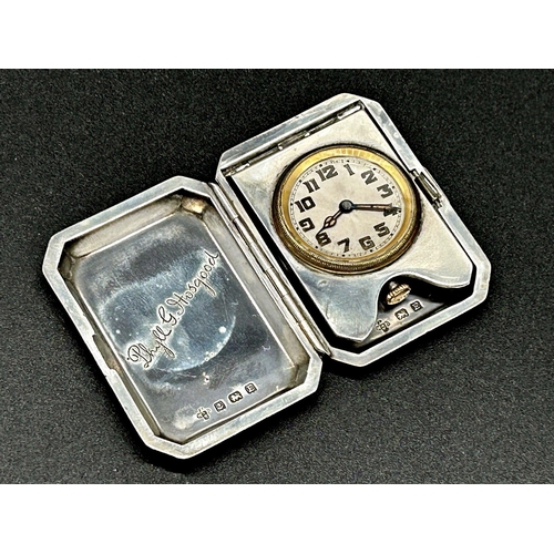 80 - 1920s engine turned silver folding travel or purse clock, sunburst dial with Arabic numerals, inscri... 