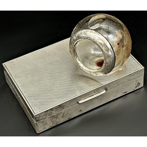 83 - '800' silver engine turned cigarette box, cedar lined interior, 13cm long, with a silver rimmed glas... 