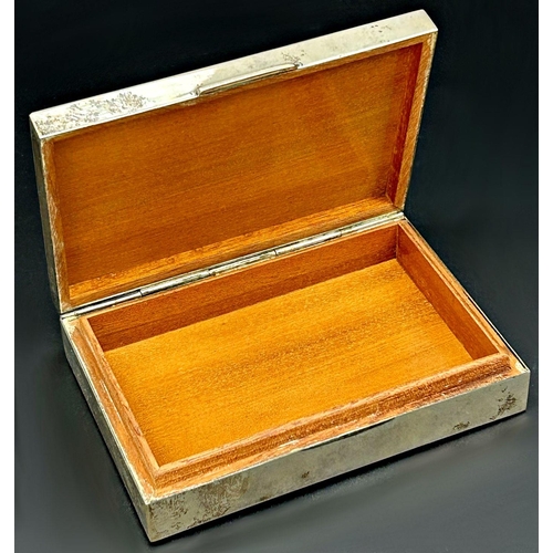 83 - '800' silver engine turned cigarette box, cedar lined interior, 13cm long, with a silver rimmed glas... 