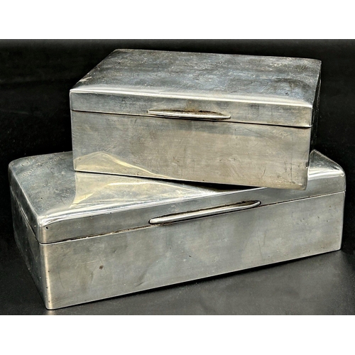 85 - Two silver cigarette boxes, both with inscriptions, 18 & 13cm long respectively