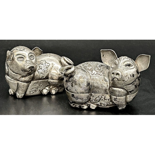 90 - Pair of Far Eastern silver character betel nut boxes in the form of pigs, 9 & 7.5cm long, 4.5oz appr... 