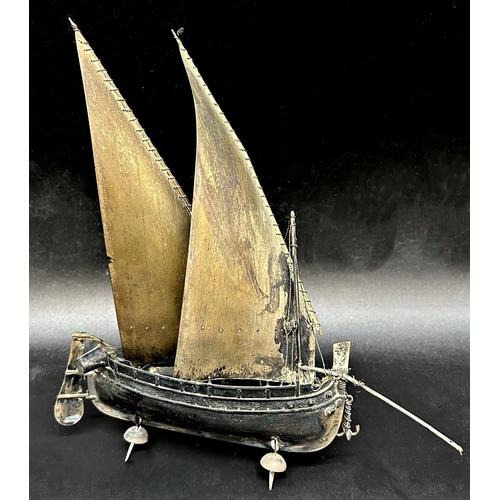 97 - Eastern white metal (untested) study of a junk ship, 21cm high, 4oz approx