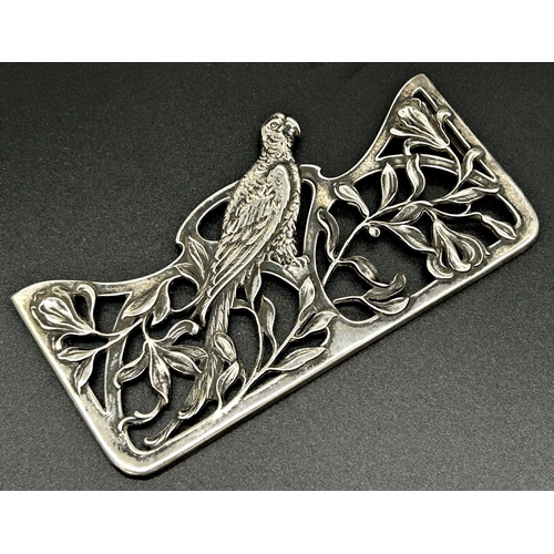 113 - Sterling silver card sleeve, pierced with a tropical bird, 11.5cm