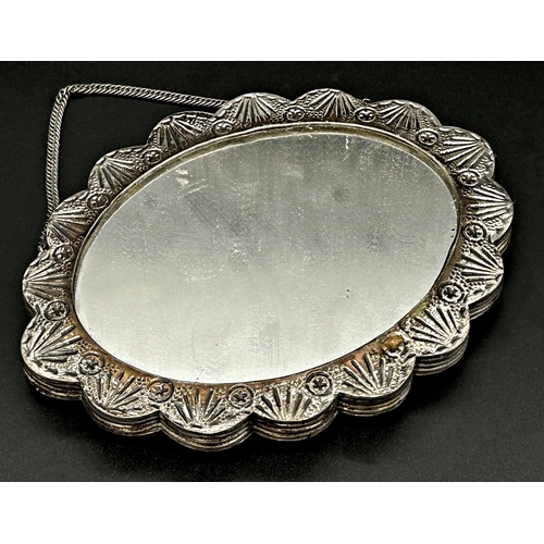 114 - Turkish '900' Bedo silver wedding mirror, geometric repousse floral decoration, 17cm wide