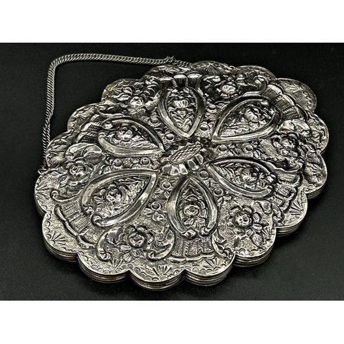 114 - Turkish '900' Bedo silver wedding mirror, geometric repousse floral decoration, 17cm wide