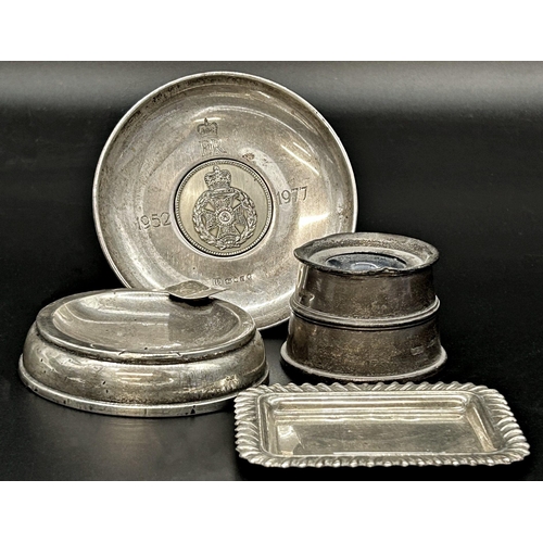 115 - Mixed silver to include ashtray, alms type dish fitted with a nickel token, inkwell and pin tray (4)