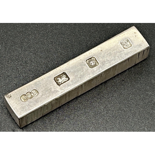 116 - Solid silver ingot, maker Gerald Benney, London 1973, 8.5cm long, 6oz approx