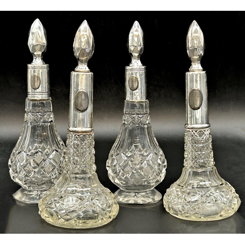 118 - Two pairs of silver collared scent decanters, monogrammed with a P and hobnail cut glass, 20cm high ... 