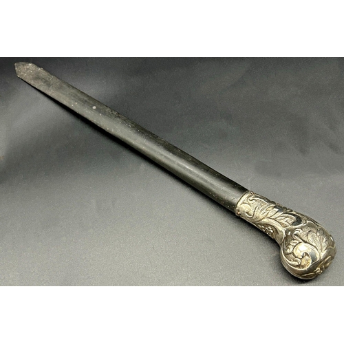 101 - Antique white metal pistol grip handled ebony page turner or letter opener, unmarked