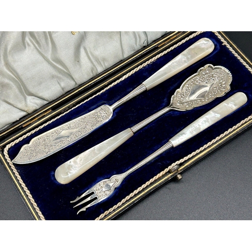 141 - Cased set of three pearl handled cutlery, butter knife, pickle fork, egg spoon, maker Walker and Hal... 