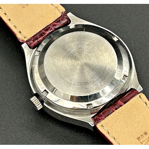 351 - Good 1970s gents Ulysse Nardin Automatic stainless steel wristwatch, 36mm case, burgundy dial with b... 