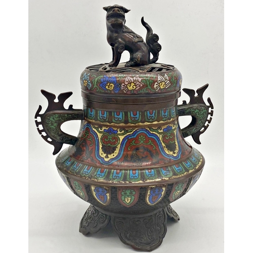 1073 - Good Japanese bronze and cloisonne twin handled koro, the lid mounted by a seated Dog of Fo, 38cm hi... 