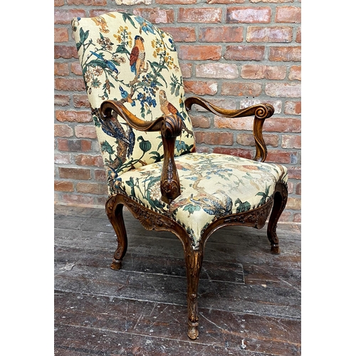 1465 - Good quality carver lounge chair, with tropical bird upholstery, the arms and framework carved with ... 