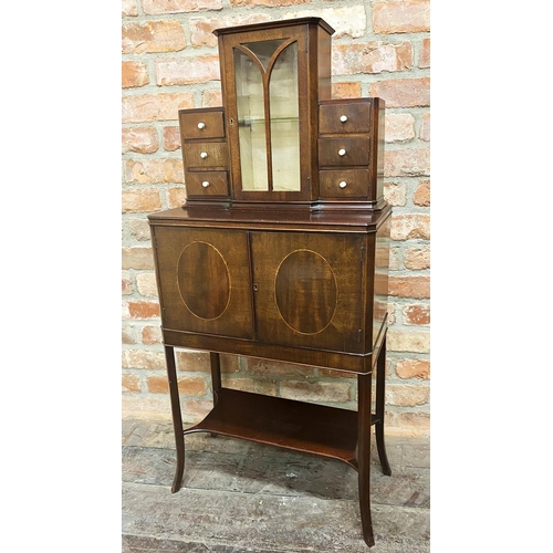 1466 - Good early 20th century exhibition quality cabinet, raised glazed back flanked by six small drawers,... 