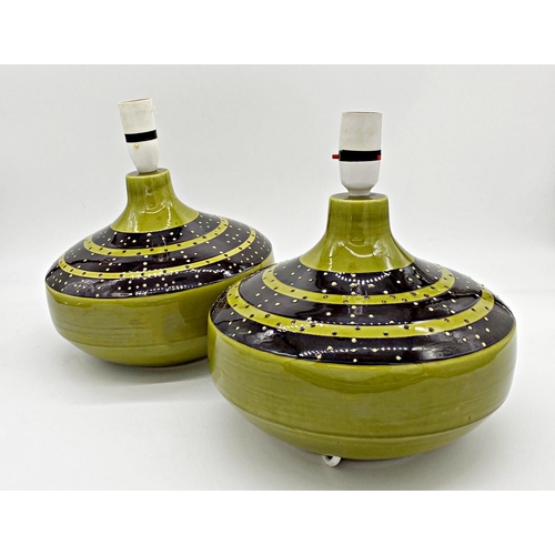 1234 - Pair of Honiton pottery squat baluster ceramic lamps, with polka dot decoration on an olive green gr... 