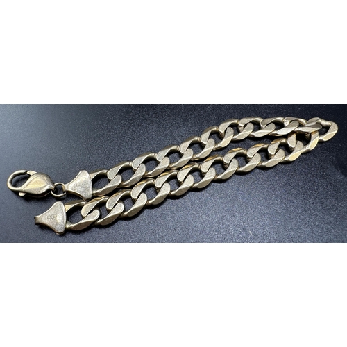 232 - 9ct flat curb link bracelet, 23.5cm long, 27.6g