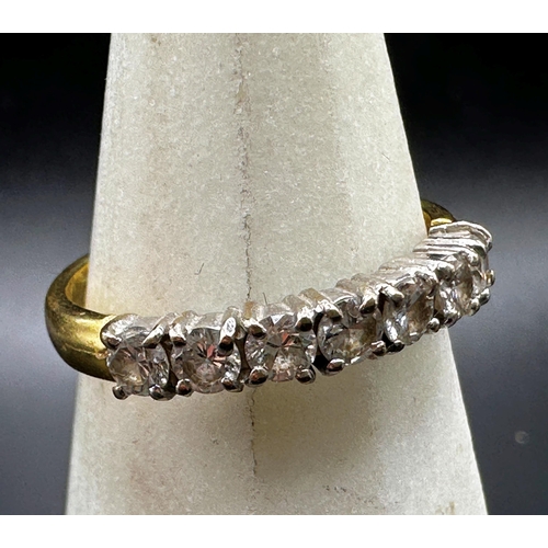 264 - 18ct seven stone diamond ring, set with seven .10ct diamonds, size P, 4.2g