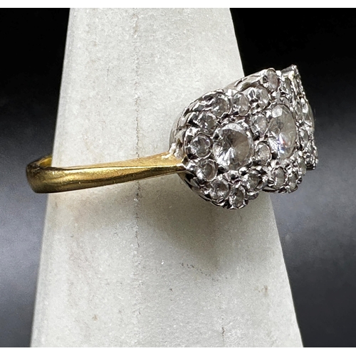 287 - 18ct Art Deco diamond cluster ring, central .30 diamond flanked by two further .25 diamonds framed w... 