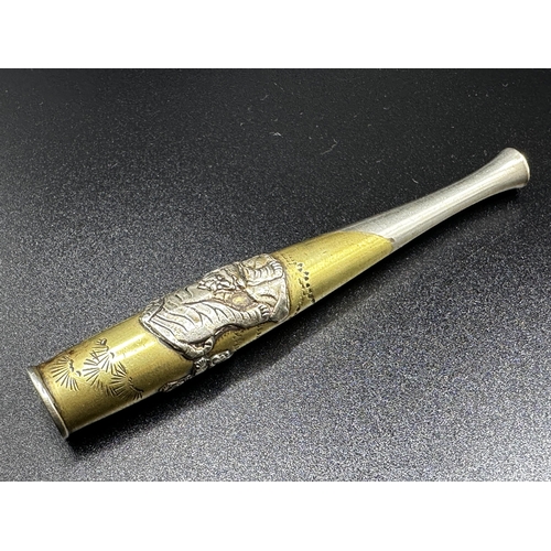 1070 - Japanese white and yellow metal cheroot holder or pipe, applied with a tiger and robed figure, 10cm ... 