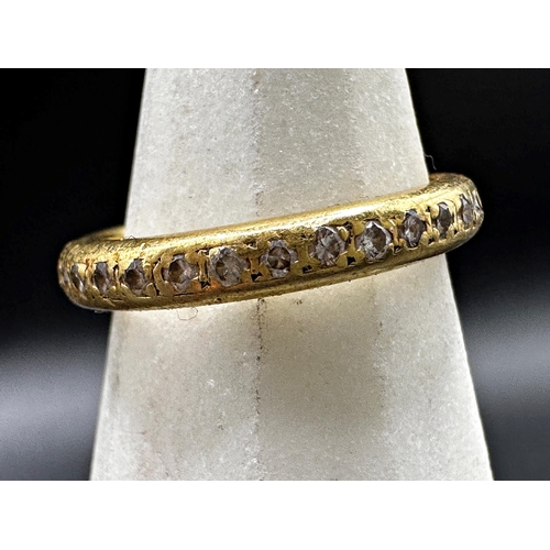 309 - 18ct diamond eternity ring, size M, 5g (one stone vacant)