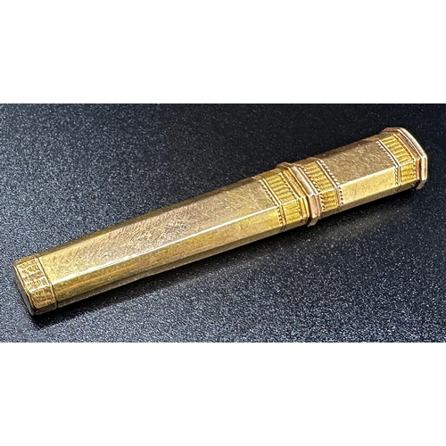 315 - Unmarked high carat gold toothpick or needle case with engine turned boarders, 6.5cm long, 6.5g