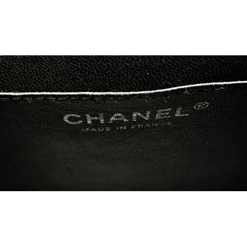 451 - Chanel black caviar jumbo classic double flap handbag. 
This timeless Chanel Classic is in black cav... 