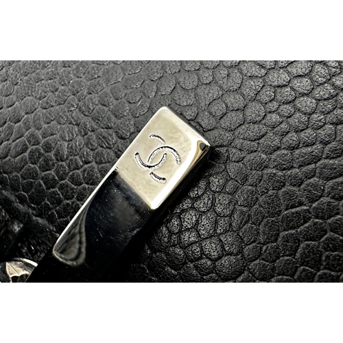 451 - Chanel black caviar jumbo classic double flap handbag. 
This timeless Chanel Classic is in black cav... 