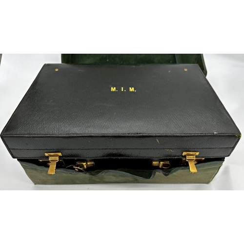 188 - Exceptional quality Edwardian racing green leather vanity case, with canvas protector, enclosing eig... 