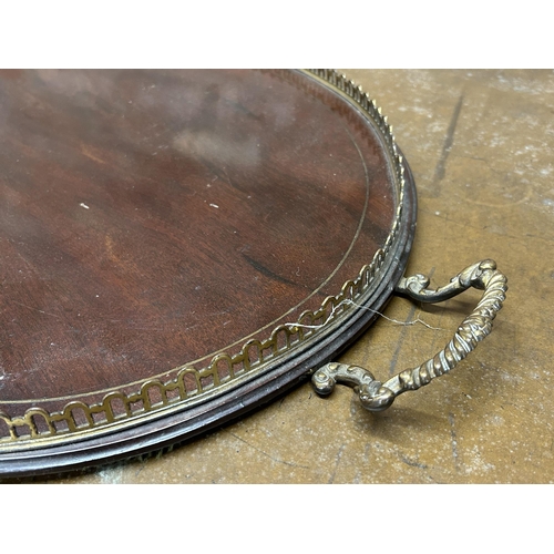 1112 - 19th century rosewood and brass inlaid kidney shaped twin handled gallery tray, 76.5cm long