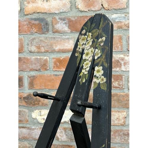 1434 - Good quality Victorian decorative ebonised picture easel, hand painted with floral blossom, 182cm hi... 