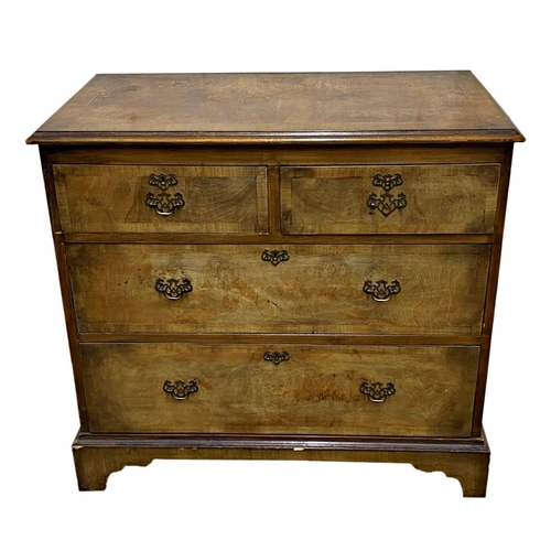 1400 - Early 20th century burr walnut veneered chest of drawers the moulded cross banded top over two short... 