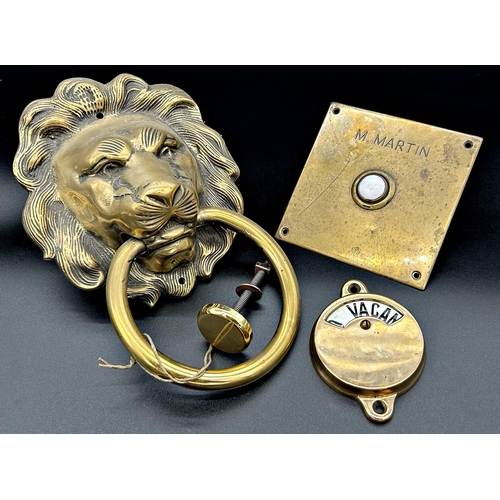 1173 - Cast brass lion head door knocker and striker, 25 x 16cm with ceramic doorbell and Vacant & Engage c... 