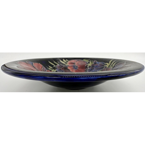 1028 - Moorcroft peony pattern dish, 25cm diameter with further smaller Moorcroft dish (2)