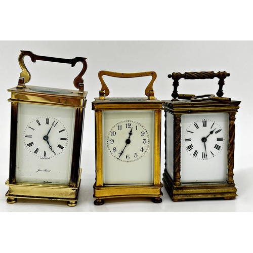 391 - Three French brass carriage clocks, one with barley twist column case (3)