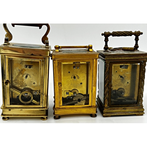 391 - Three French brass carriage clocks, one with barley twist column case (3)