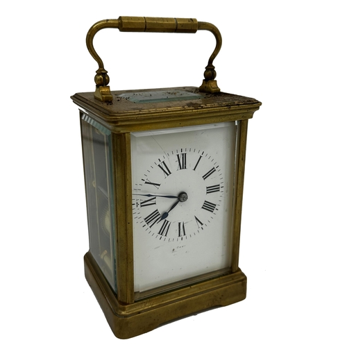 392 - Good quality French brass carriage clock, enamel dial, striking on a gong, 13.5cm high