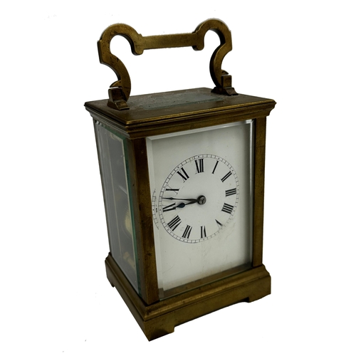 393 - Good quality French brass carriage clock, enamel dial, striking on a gong, 13.5cm high